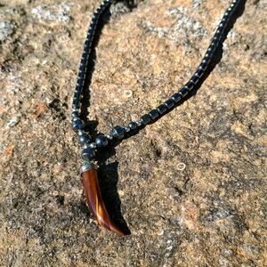 Gender Neutral Hematite necklace w Tigers Eye claw horn pendant, gothic jewelry